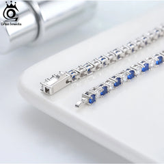 ORSA JEWELS Tennis Bracelet: 925 Sterling Silver, Featuring 3.0mm Clear and Sapphire Cubic Zirconia, Women's Fashion Chain Bracelet