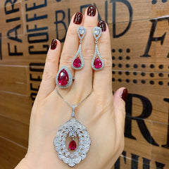 Exquisite Retro Set: Luxurious Tassel Earrings, Necklace, and Ring adorned with Drop-Shaped Ruby Crystals