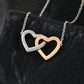 Interlocking Hearts Pendant - A Symbol of Transition